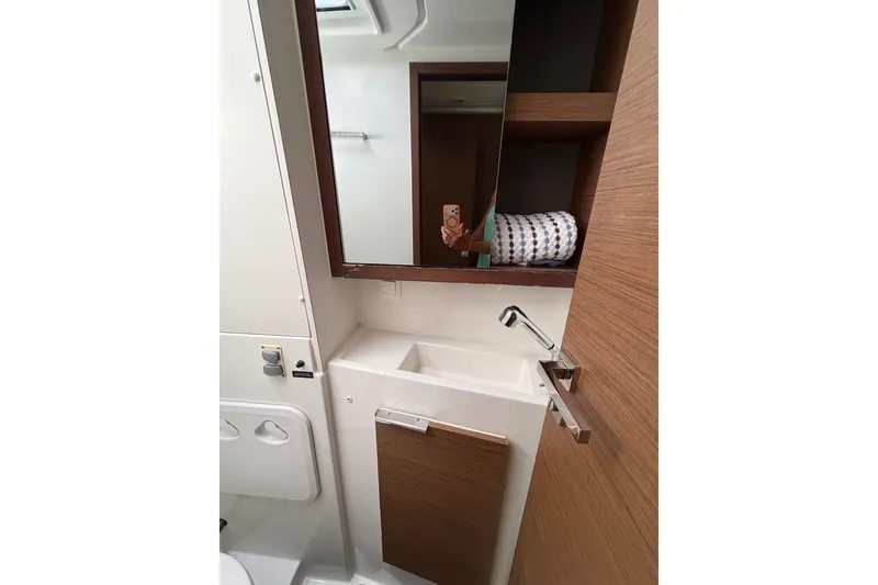 Slide: The Image of Bathroom interior of 2020 Lagoon 40 catamaran with modern sink and mirror. - 20
