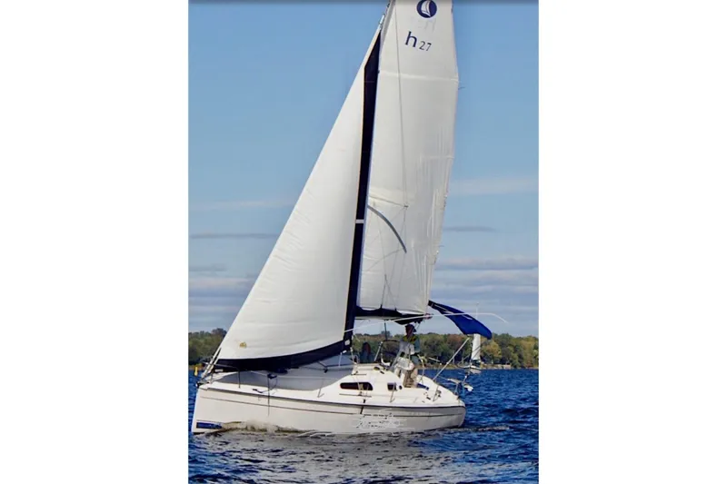 Slide: The Image of Sailing on a lake, 2013 Marlow-Hunter 27 yacht with white sails. - 10