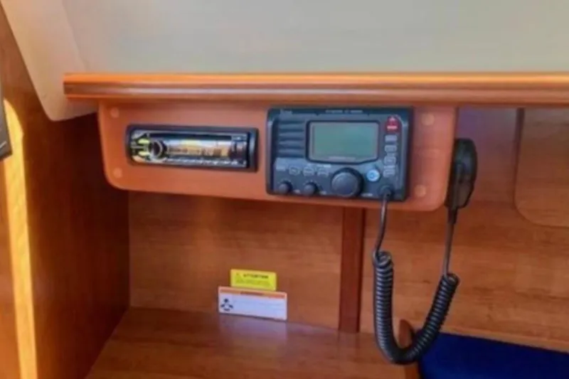 Slide: The Image of Control panel of a 2013 Marlow-Hunter 27 sailboat with radio and audio system. - 20
