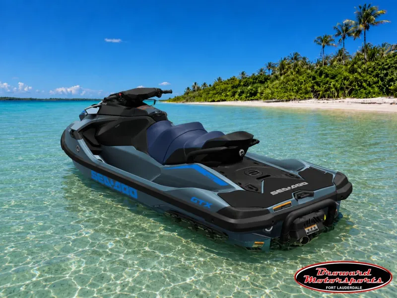 Slide: The Image of A 2026 Sea-Doo GTX 230 jet ski floats in clear turquoise water near a tropical island. - 3