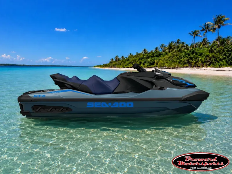 The Image of A 2026 Sea-Doo GTX 230 jet ski floats on clear turquoise water near a tropical island. - 0