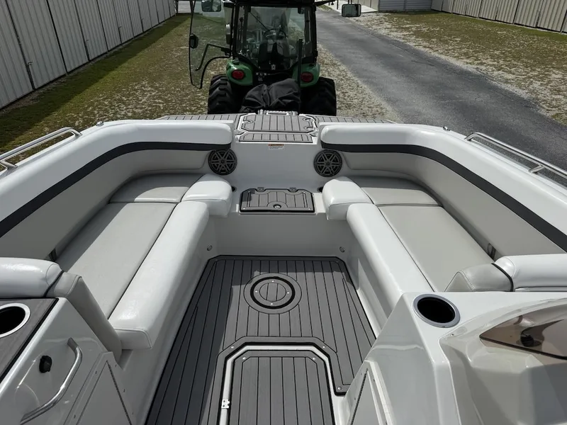 Slide: The Image of The image shows the cockpit of a 2023 Starcraft SVX 211 OB with gray upholstery and flooring. - 11