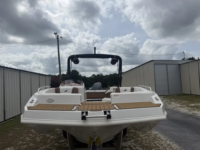 Slide: The Image of The image shows a 2025 Starcraft SVX 231 OB boat on a trailer. - 5