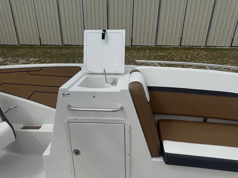 Slide: The Image of The image shows the cockpit of a 2025 Starcraft SVX 231 OB with a built-in sink. - 10
