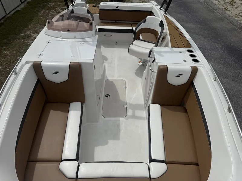 Slide: The Image of The image shows the spacious cockpit of a 2025 Starcraft SVX 231 OB with comfortable seating. - 9