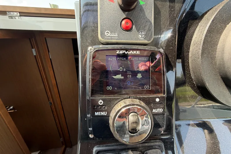 Slide: The Image of Control panel of a 2020 Jeanneau NC Sport 895 boat with Zipwake system. - 60