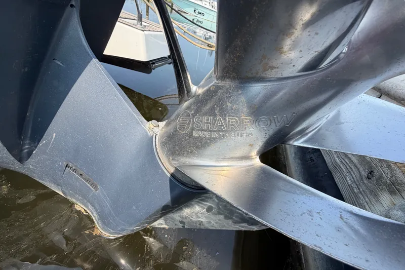 Slide: The Image of Close-up of a Sharrow propeller on a 2020 Jeanneau NC Sport 895 boat. - 70