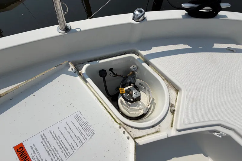 Slide: The Image of 2020 Jeanneau NC Sport 895 boat deck with open storage compartment. - 51