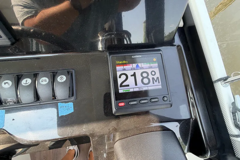 Slide: The Image of Control panel of a 2020 Jeanneau NC Sport 895 boat with Garmin display. - 67