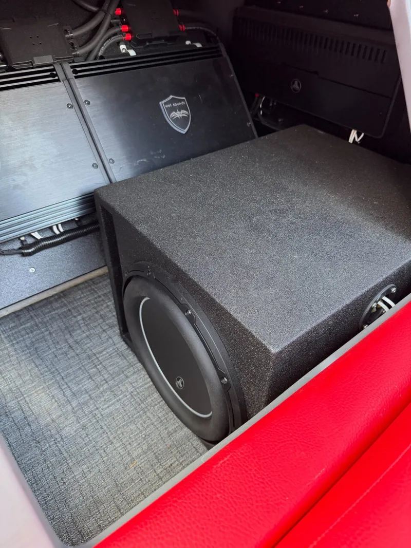 Slide: The Image of A powerful sound system with subwoofer and amplifier in a boat. - 18