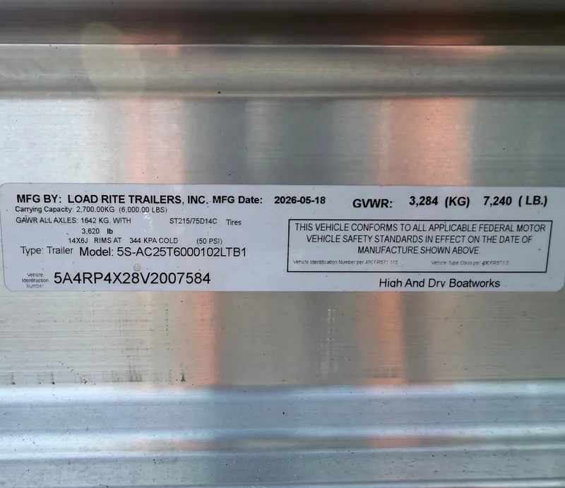 Slide: The Image of Cobia 240 Dual Console 2021: Trailer label with specifications and manufacturer details. - 37
