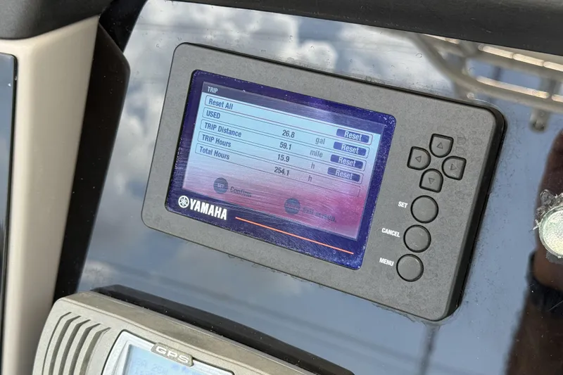 Slide: The Image of Yamaha display on 2020 Robalo R230 Center Console showing trip data and fuel usage. - 15