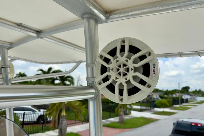 Slide: The Image of Speaker mounted on a 2020 Robalo R230 Center Console boat's metal frame. - 45