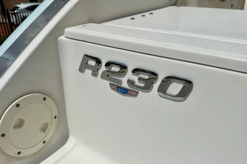 Slide: The Image of 2020 Robalo R230 Center Console boat emblem detail. - 41