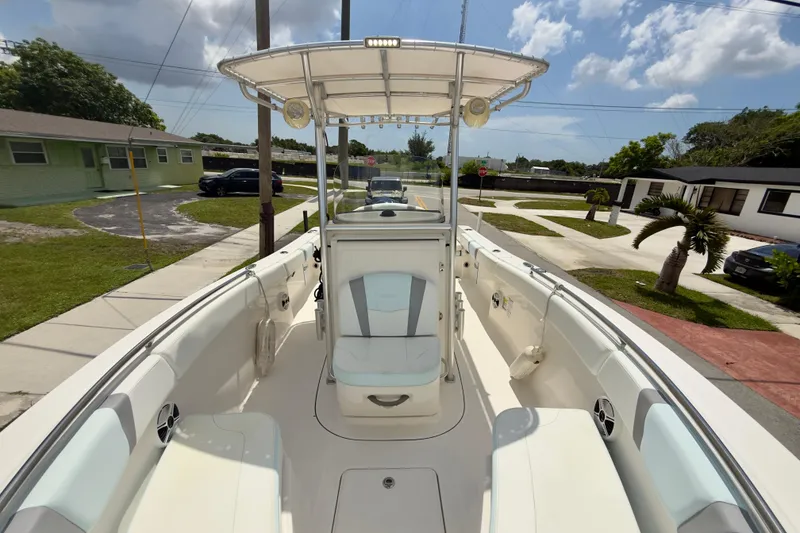 Slide: The Image of 2020 Robalo R230 Center Console boat with spacious seating and modern design. - 37