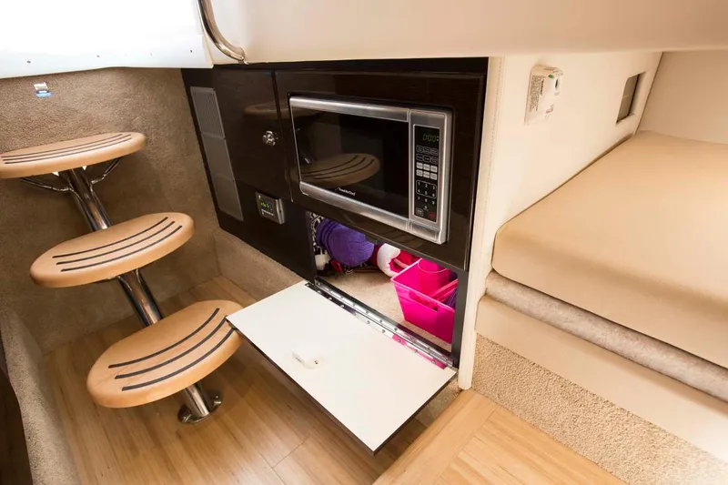 Slide: The Image of Manufacturer Provided Image: Interior of 2016 Formula 330 Crossover Bowrider with microwave and storage. - 10