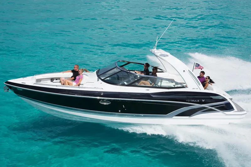 The Image of Manufacturer Provided Image: 2016 Formula 330 Crossover Bowrider cruising on clear blue water. - 8