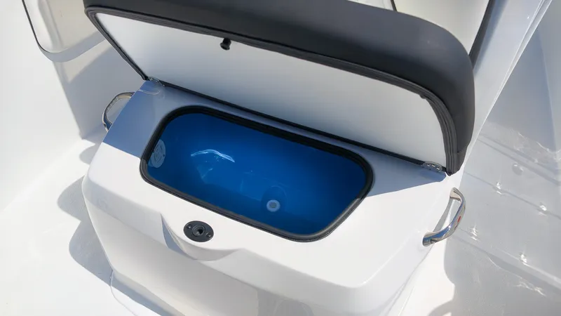 Slide: The Image of An open storage compartment with a blue interior on a boat. - 20