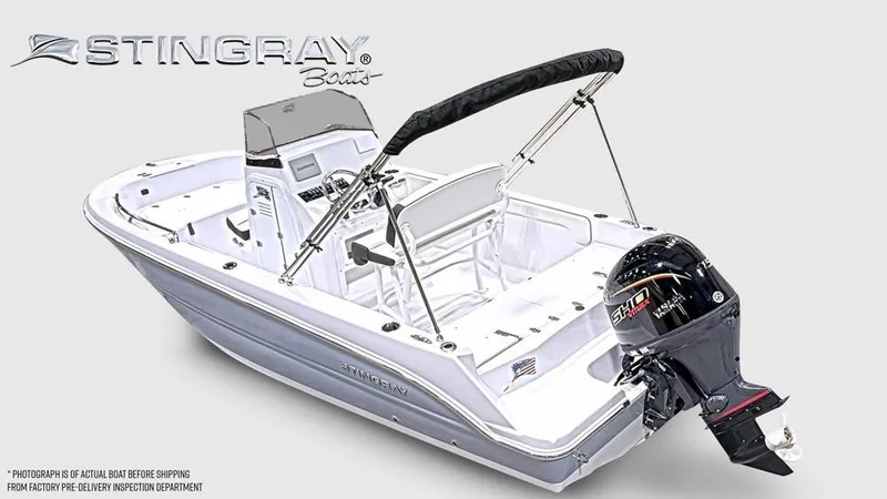 Slide: The Image of A modern Stingray 17 CC boat with outboard motor and bimini top, ideal for leisure cruising. - 4