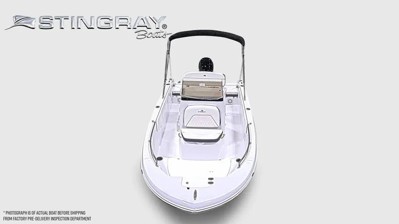 Slide: The Image of A sleek Stingray 17 CC boat with an open deck and black Bimini top. - 4