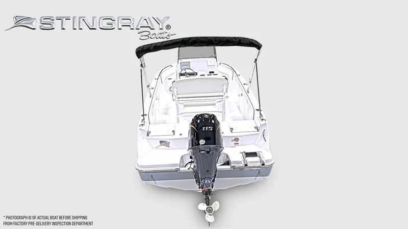 The Image of The image shows a Stingray 17 CC boat from the rear, featuring an outboard motor and black sunshade. - 1