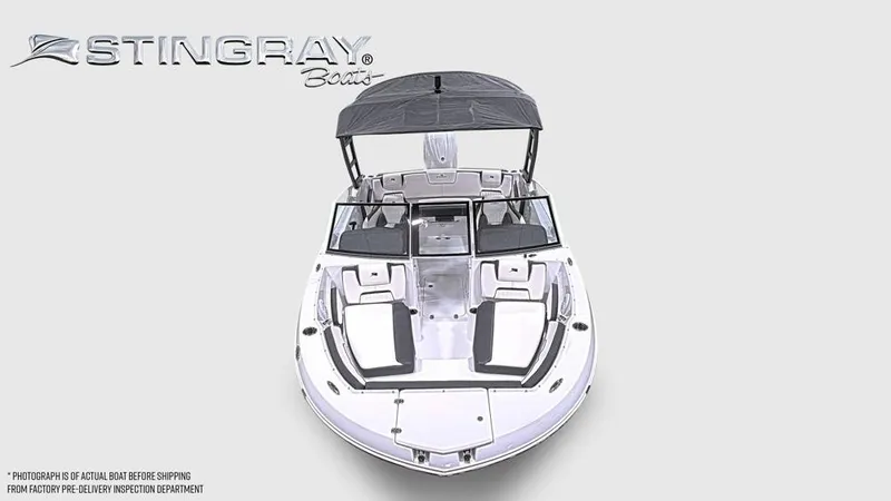 Slide: The Image of Stingray 20 SBX 2027: Sleek design with spacious deck, black sunshade, and comfortable seating. - 7