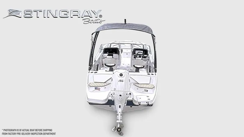 Slide: The Image of The image shows a modern Stingray 20 SBX boat with a sleek design and gray canopy. - 3