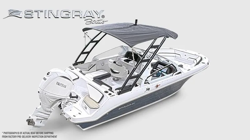 The Image of A modern 2027 Stingray 20 SBX with a Yamaha outboard motor and protective sunshade. - 1