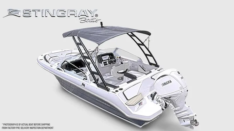 Slide: The Image of The image shows a modern Stingray 20 SBX boat with a Yamaha outboard motor. - 2
