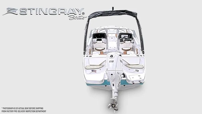 Slide: The Image of The image shows a 2027 Stingray 20 SBX boat with an outboard motor. - 3
