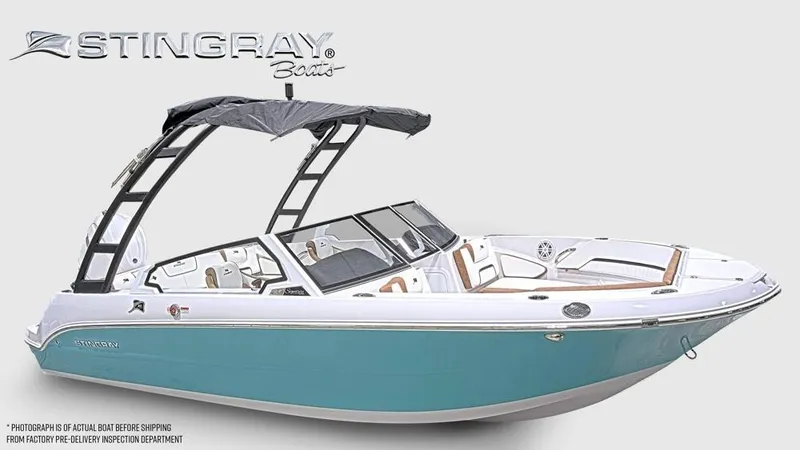 Slide: The Image of A modern 2027 Stingray 20 SBX with a turquoise hull and black sunshade. - 8