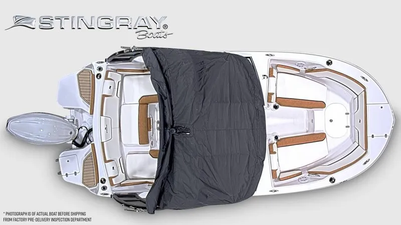 Slide: The Image of Overhead view of a Stingray 20 SBX boat with cover, showing seating and helm area. - 5