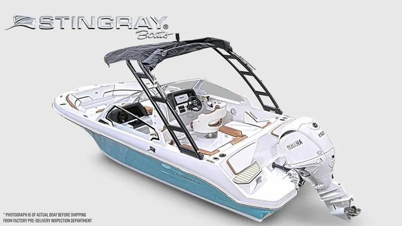 Slide: The Image of The image shows a modern Stingray 20 SBX boat with sleek design and an outboard motor. - 2