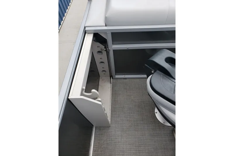Slide: The Image of 2023 Bentley Pontoons 223 4 Party Fish interior with storage compartment and seating. - 12