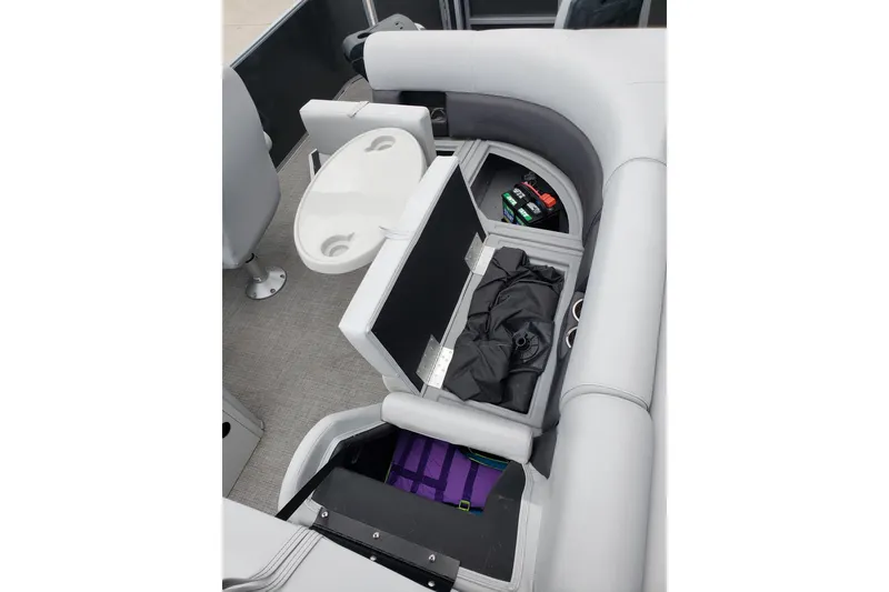 Slide: The Image of 2023 Bentley Pontoons 223 4 Party Fish interior storage compartments and seating arrangement. - 14