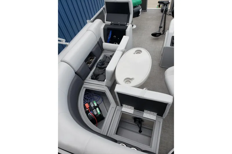 Slide: The Image of 2023 Bentley Pontoons 223 4 Party Fish interior with storage compartments and seating. - 15
