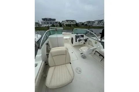 Slide: The Image of 2007 Hydra-Sports Lightning 202 DC boat interior with seating and controls. - 2