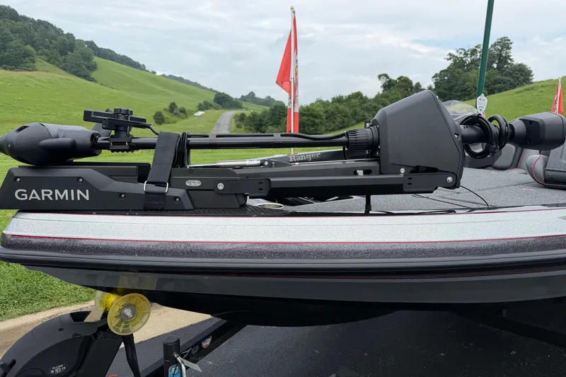 Slide: The Image of 2025 Ranger Z518 Cup-Equipped boat with Garmin trolling motor on a scenic road. - 8