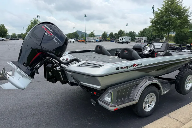 Slide: The Image of 2025 Ranger Z518 Cup-Equipped boat with Mercury Pro XS engine in parking lot. - 3