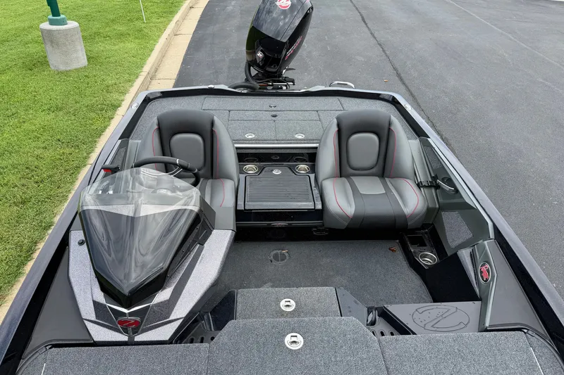 Slide: The Image of 2025 Ranger Z518 Cup-Equipped boat interior with dual seats and steering console. - 11