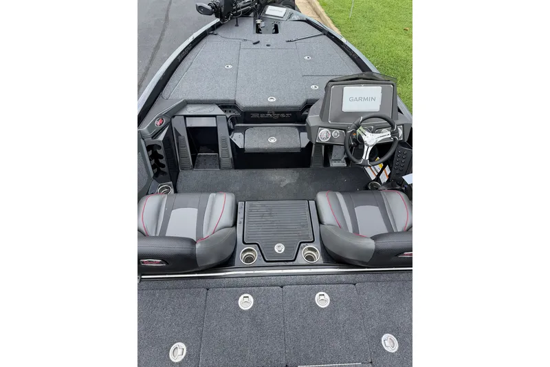 Slide: The Image of 2025 Ranger Z518 Cup-Equipped boat interior with Garmin display and dual seating. - 6