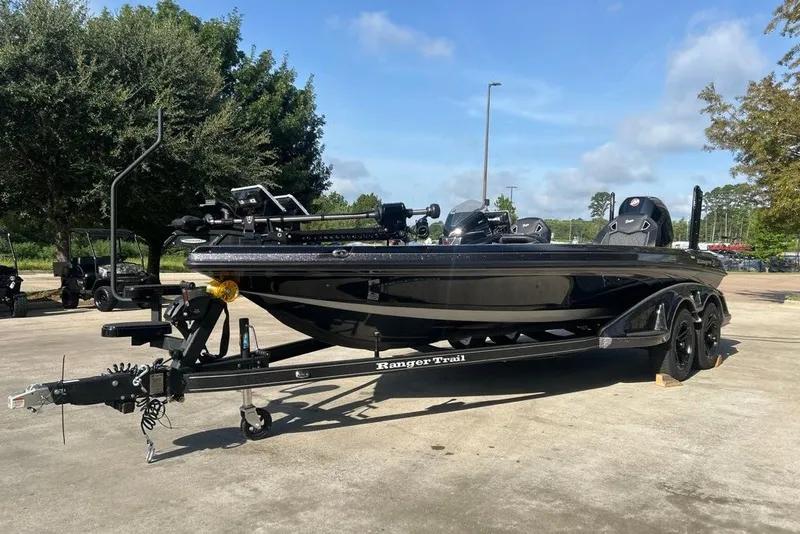 The Image of 2026 Ranger Z520R boat on trailer, parked outdoors under clear sky. - 0