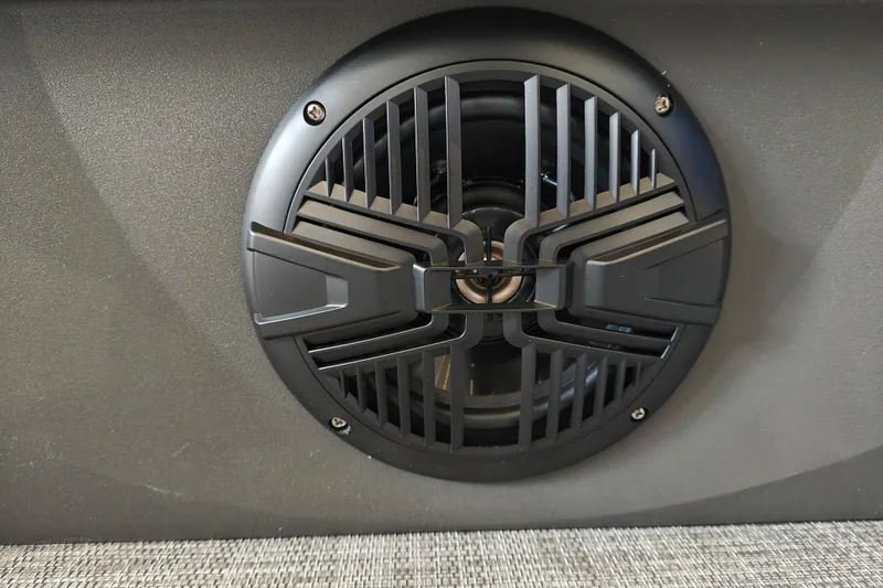 Slide: The Image of Close-up of a speaker on a 2026 Sun Tracker Party Barge 20 DLX. - 22