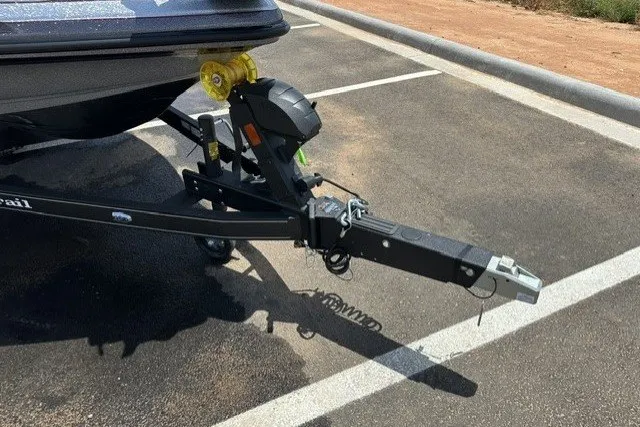 Slide: The Image of 2026 Ranger Z520 boat trailer hitch in a parking lot. - 10