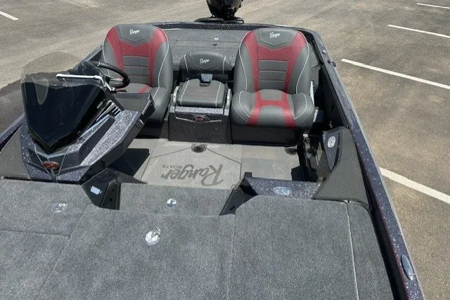 Slide: The Image of 2026 Ranger Z520 boat interior with dual seats and steering console. - 17