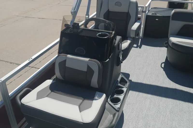 Slide: The Image of 2026 Sun Tracker Bass Buggy 18 DLX interior with comfortable seating and modern design. - 7