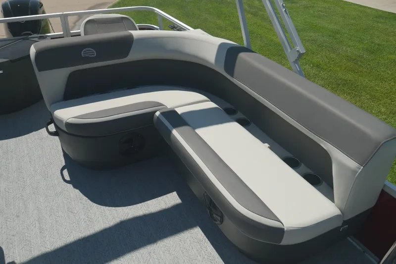 Slide: The Image of 2026 Sun Tracker Bass Buggy 18 DLX pontoon boat seating, gray and white upholstery. - 9