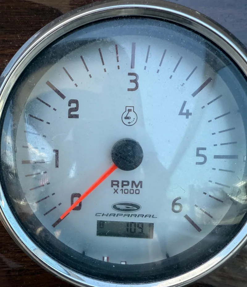 Slide: The Image of Close-up of 2006 Chaparral Signature 276 RPM gauge displaying 109 hours. - 10