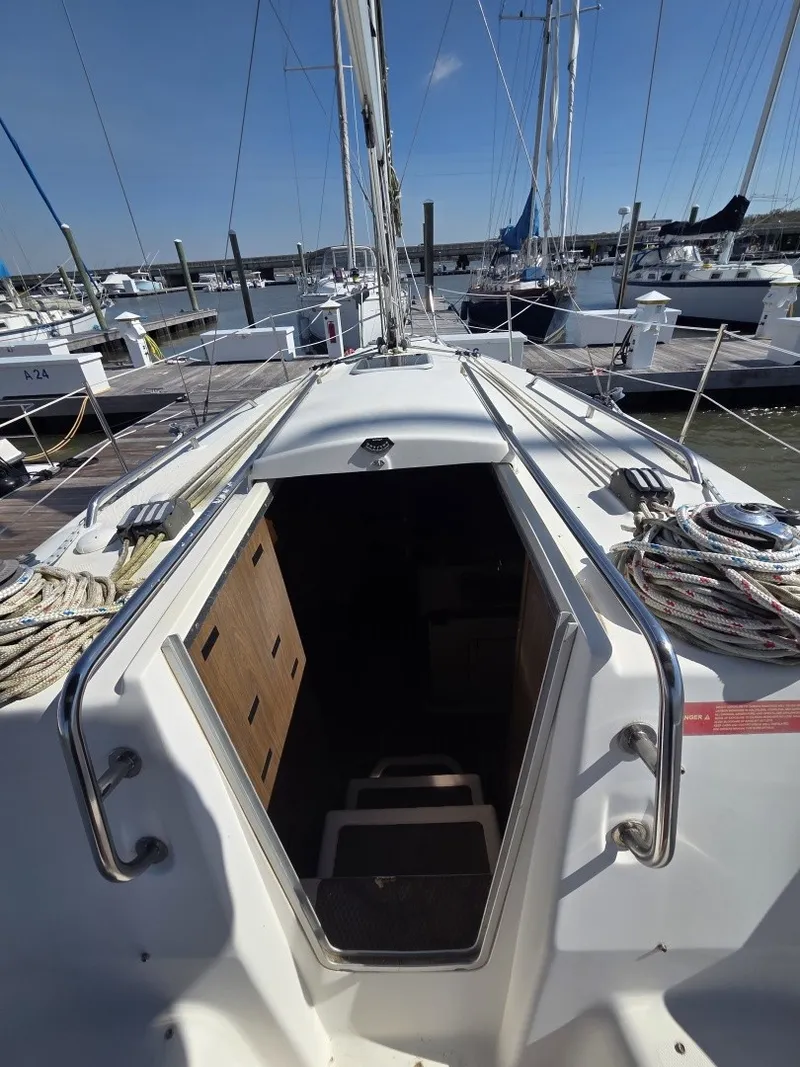 Slide: The Image of The image shows the cockpit of a 2005 Hunter 31, looking towards the cabin. - 11