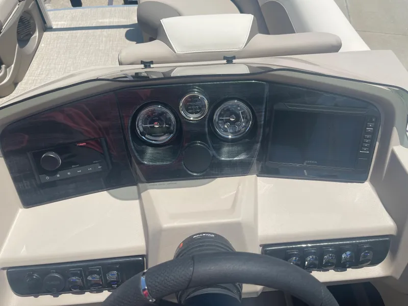 Slide: The Image of The image shows the dashboard of a 2024 Avalon LSZ Rear Fish with instruments and a screen. - 20